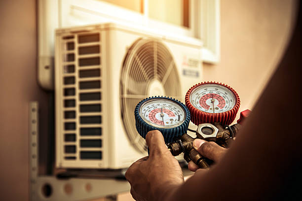Professional Hvac technician working in Norman, IN